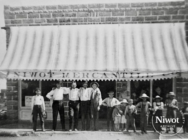 Niwot Historic Photo Series | Niwot Mercantile

Niwot Mercantile, 190B Second Avenue, is a unique structure because it is Niwot’s first cement block building. It was a pool hall, ice cream parlor, and in the back room, you could soak in a hot bath for 25 cents. Many guests at the Livingston Hotel would come for a bath because the Hotel did not have running water.

Do you know what business currently calls 190B 2nd Ave home? Swipe for the answer!

_______
 📜 This year our town is celebrating its 150th Anniversary, or Sesquicentennial. This milestone marks the recording of the town plat of Niwot by Ambrose Murray and Porter Hinman on March 30, 1875.

#niwot #niwotcolorado #niwotsesquicentennial #coloradohistory #boulderhistory #nativehistory #americanhistory #postofficehistory #niwotmercantile  #wisebuysantiques #historicbuildings #historytrivia